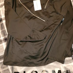 Soft, Silky feeling long sleeve shirt with Zippers.